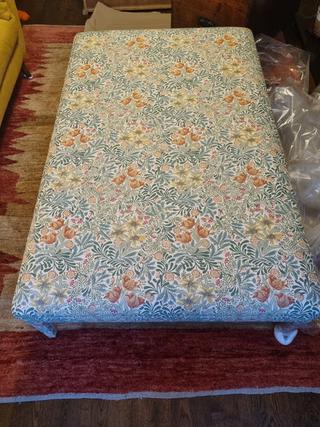 RETURNED PRODUCT An XL Ottoman with upholstered legs in Morris and Co