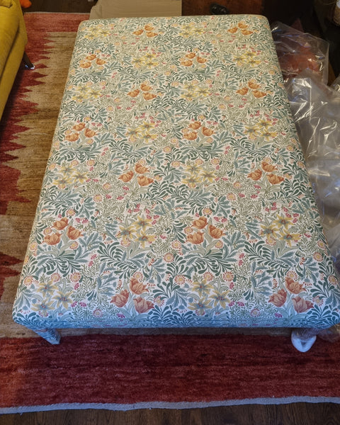 RETURNED PRODUCT An XL Ottoman with upholstered legs in Morris and Co