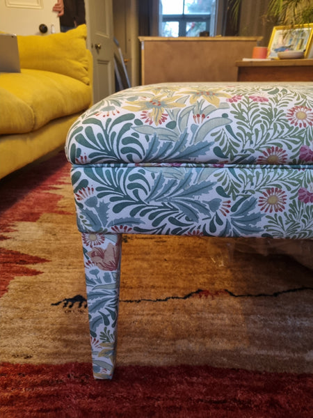 RETURNED PRODUCT An XL Ottoman with upholstered legs in Morris and Co