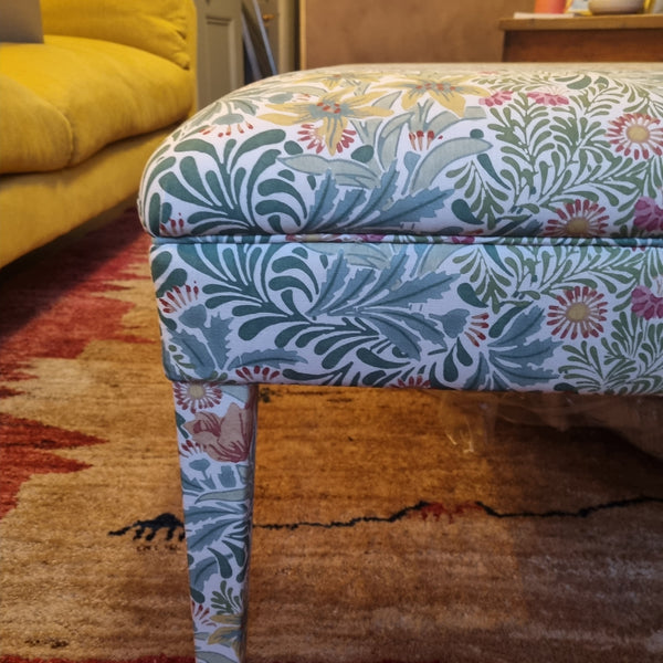 RETURNED PRODUCT An XL Ottoman with upholstered legs in Morris and Co