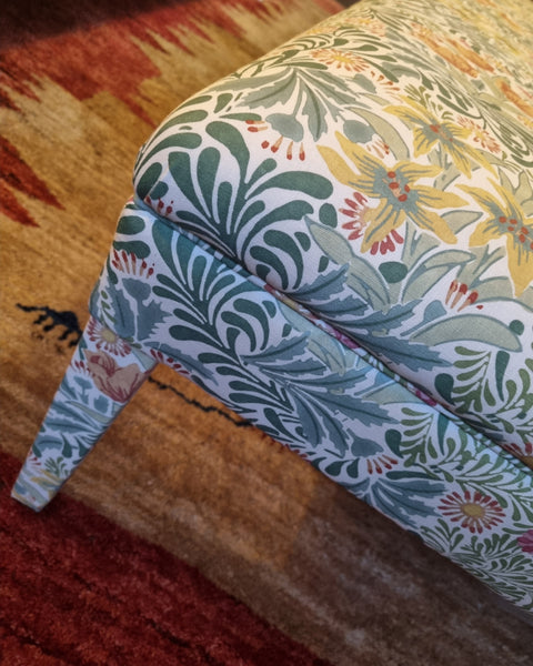 RETURNED PRODUCT An XL Ottoman with upholstered legs in Morris and Co