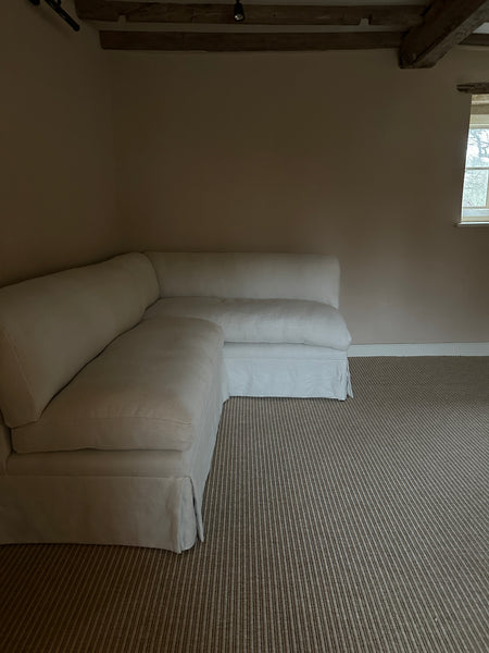 A skirted slipper banquette