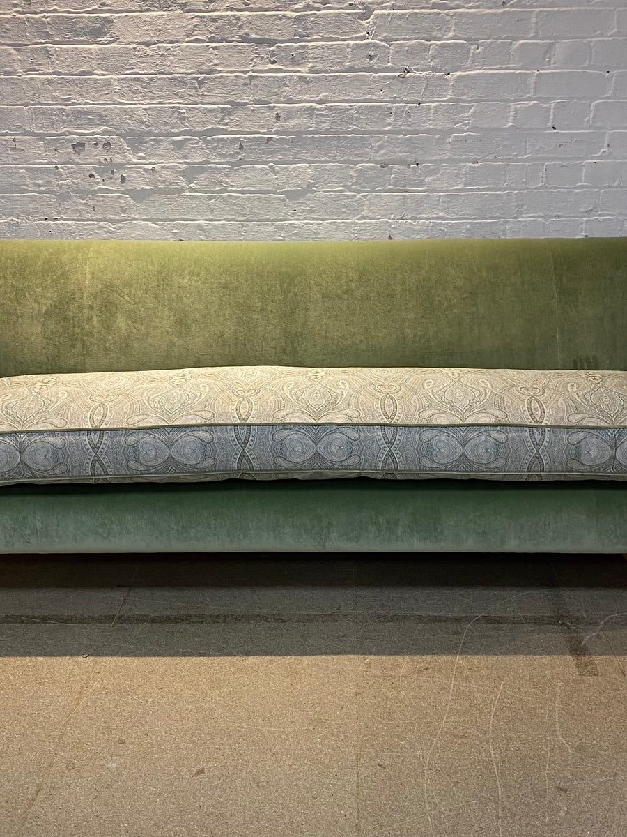 Bespoke sofa in Linwood Omega Velvet and Ian Sanderson Zarina on castor legs