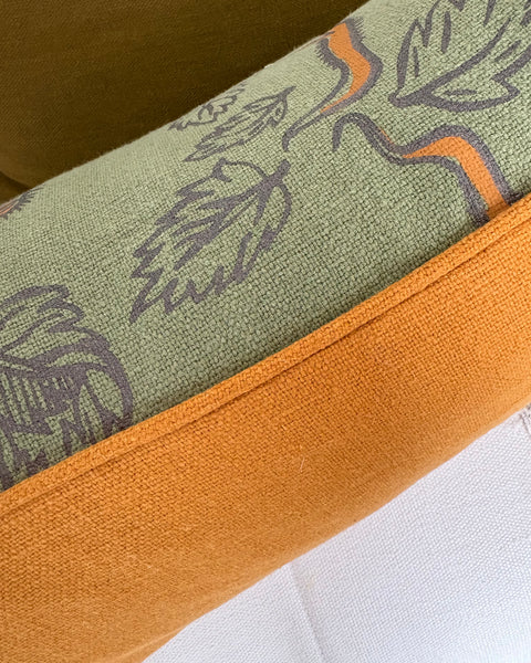 Bolster Cushion 90x35cm in Beata Heuman, nettle in sage with Amber linen back and piping