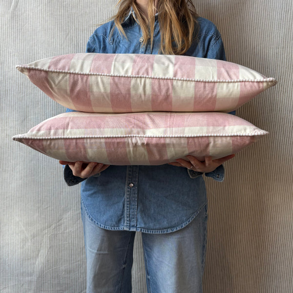 A pair of Mini bolster 60 x 30cm in Ian Mankin, suffolk check in pink with pink and white stripe piping
