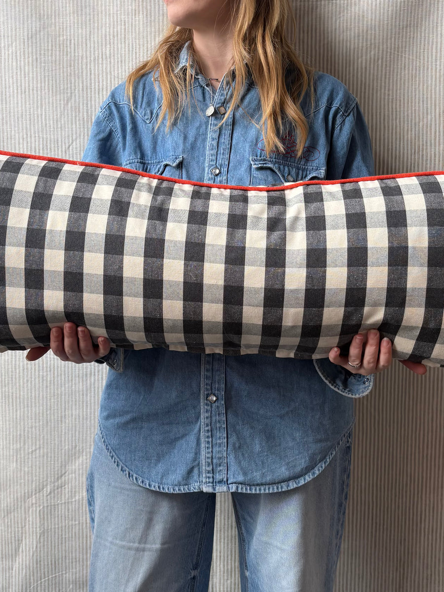 Bolster Cushion 90x35cm in Ian Mankin, suffolk checksmall in black with Bright red piping