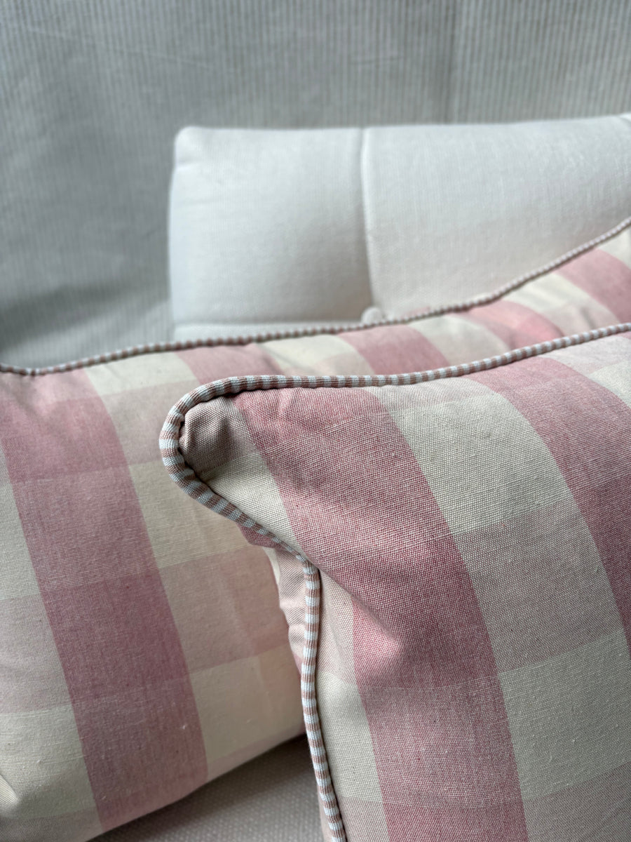 A pair of Mini bolster 60 x 30cm in Ian Mankin, suffolk check in pink with pink and white stripe piping