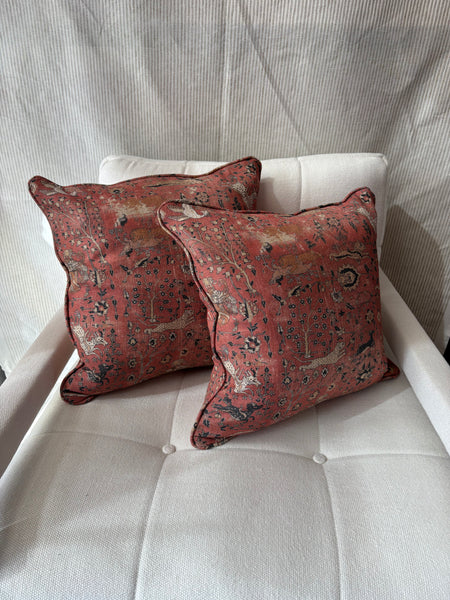 A pair of square cushions