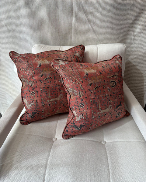 A pair of square cushions
