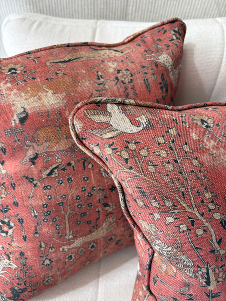 A pair of square cushions