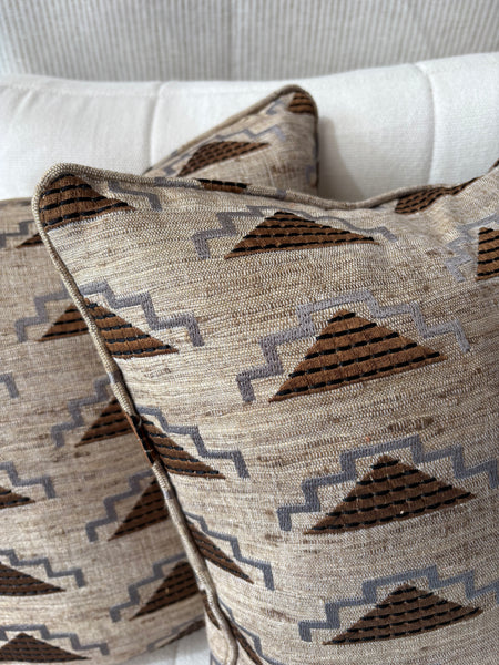 A pair of square cushions in Noblis