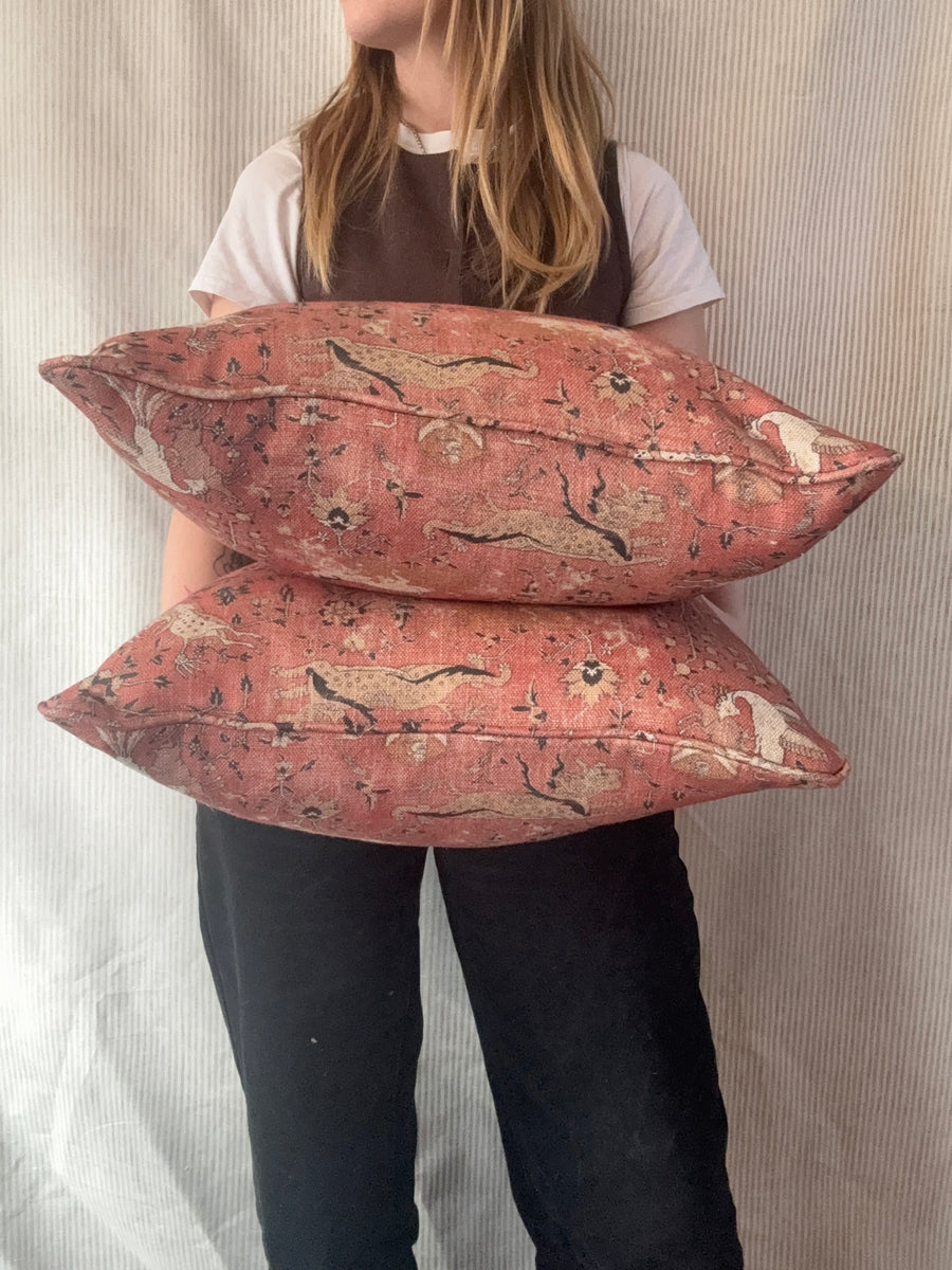 A pair of square cushions
