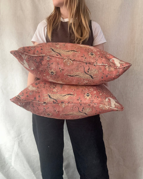 A pair of square cushions