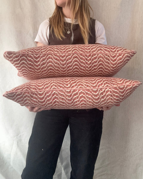 PAIR of mini bolster cushions 60 x 30cm in Nina Campbell Ondoso Red/Clay with pink piping