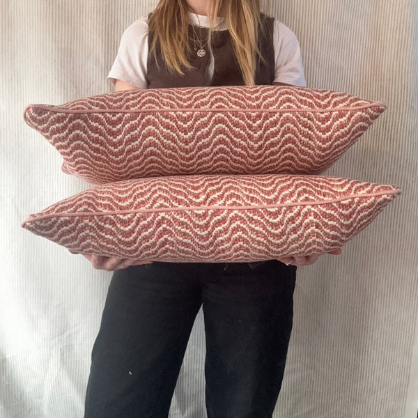 PAIR of mini bolster cushions 60 x 30cm in Nina Campbell Ondoso Red/Clay with pink piping