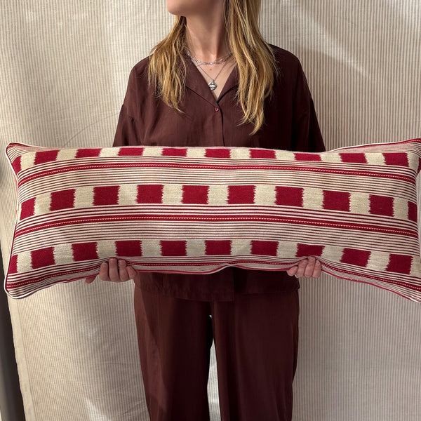 Bolster cushion 90 x 35cm in Christopher Farr, Lost and Found in ruby with Red stripe back and piping