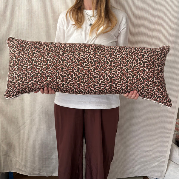 Bolster cushion 90 x 35cm in Schumacher