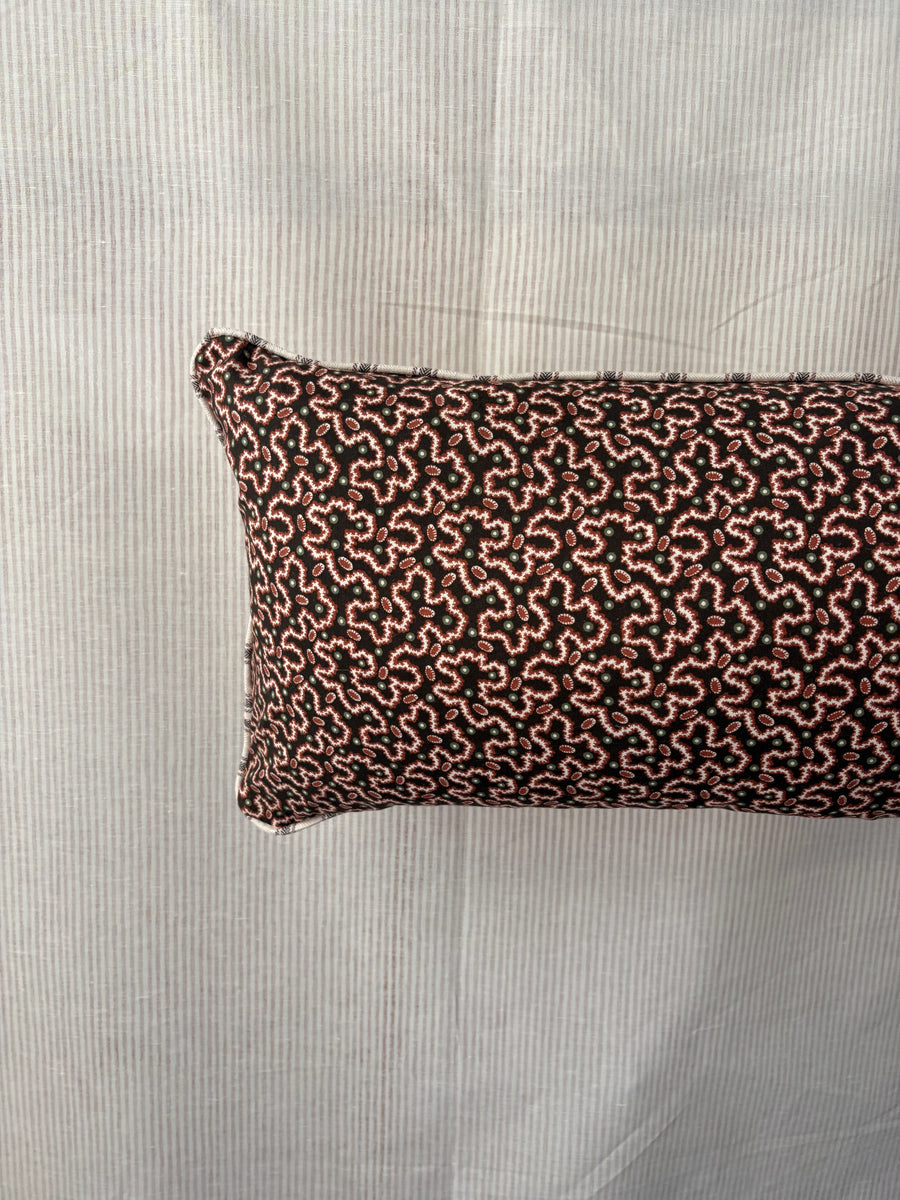 Bolster cushion 90 x 35cm in Schumacher