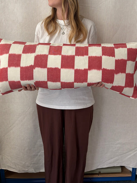 Bolster cushion 90 x 35cm in Studio Atkinson, Chequerboard in raspberry