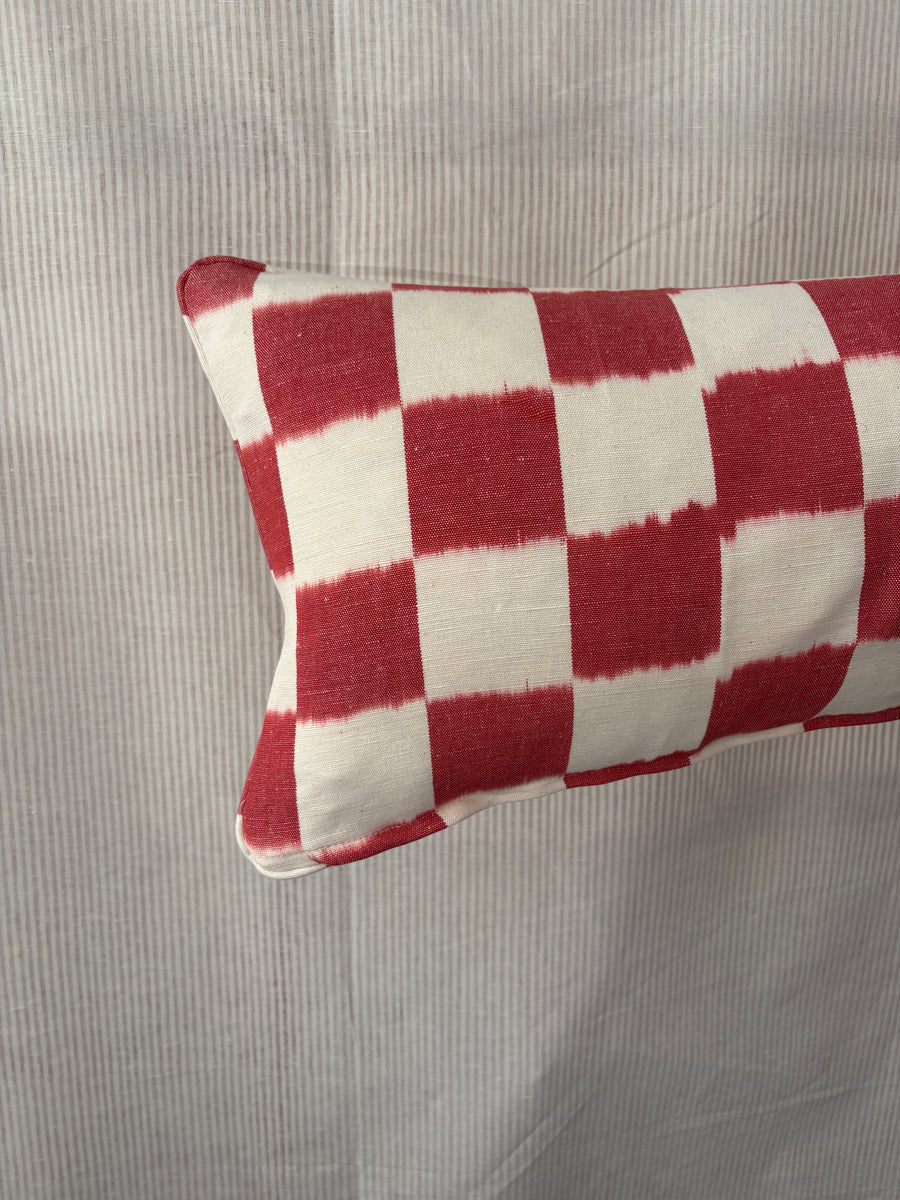Bolster cushion 90 x 35cm in Studio Atkinson, Chequerboard in raspberry