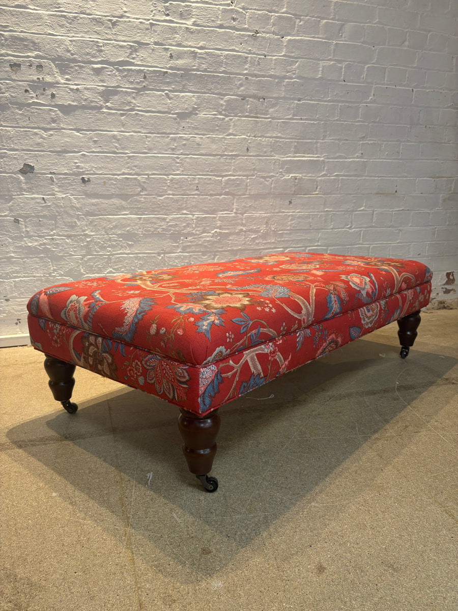 Bryher ottoman in Linwood Kitty Old Red with castors