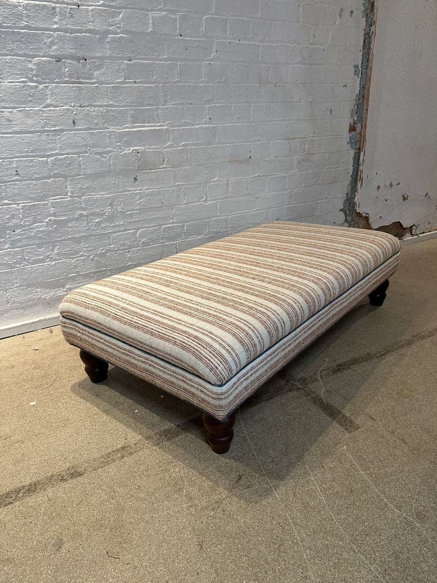 Bryher ottoman in Christopher Farr Japura Coral in Blue piping