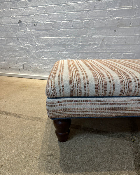 Bryher ottoman in Christopher Farr Japura Coral in Blue piping