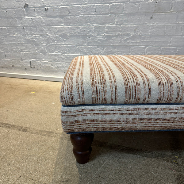 Bryher ottoman in Christopher Farr Japura Coral in Blue piping