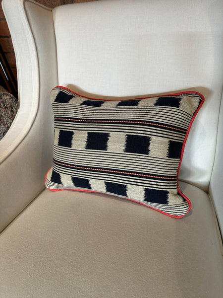 Lumbar cushion in Christopher Farr Lost and found Indigo with red piping