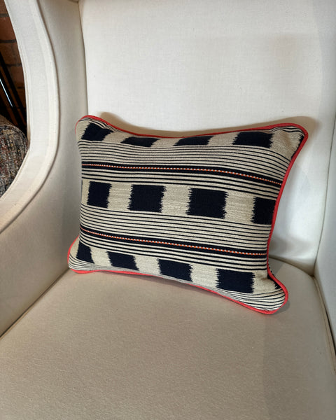 Lumbar cushion in Christopher Farr Lost and found Indigo with red piping