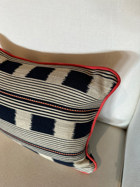 Lumbar cushion in Christopher Farr Lost and found Indigo with red piping