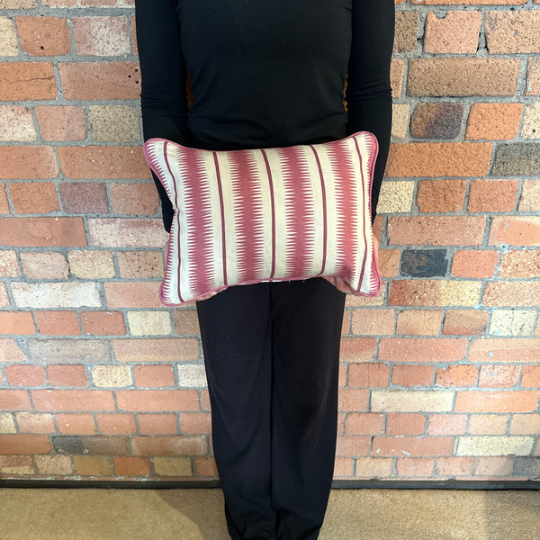 Lumbar cushion in Studio Humbug Squiggle Rhubarb