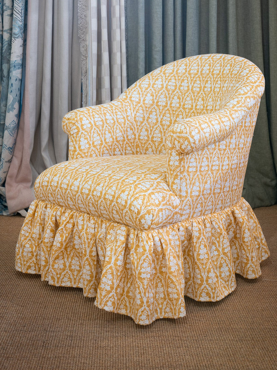 Alissa Club Chair standard with frilled skirt in Jim Thompson yellow fabric