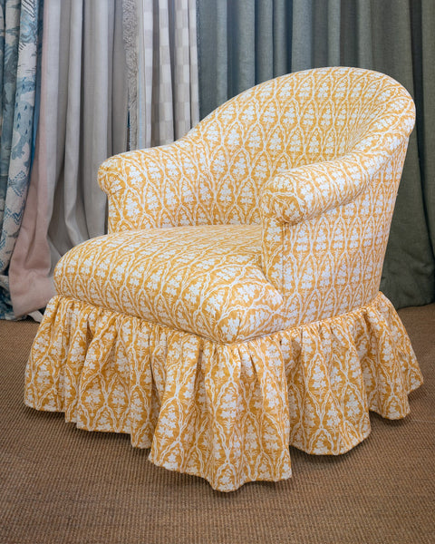 Alissa Club Chair standard with frilled skirt in Jim Thompson yellow fabric