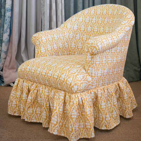 Alissa Club Chair standard with frilled skirt in Jim Thompson yellow fabric