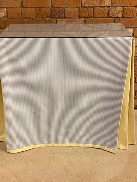 Ruth Table with table cloth and glass top