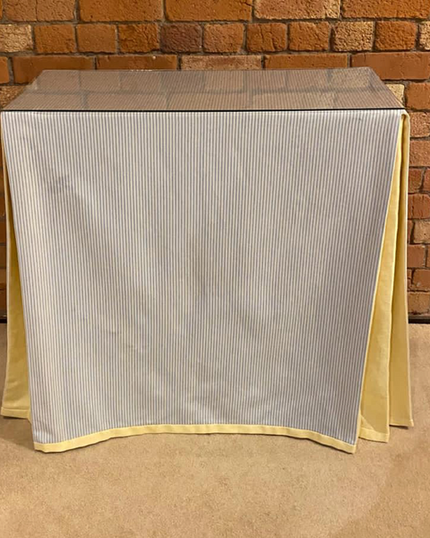 Ruth Table with table cloth and glass top