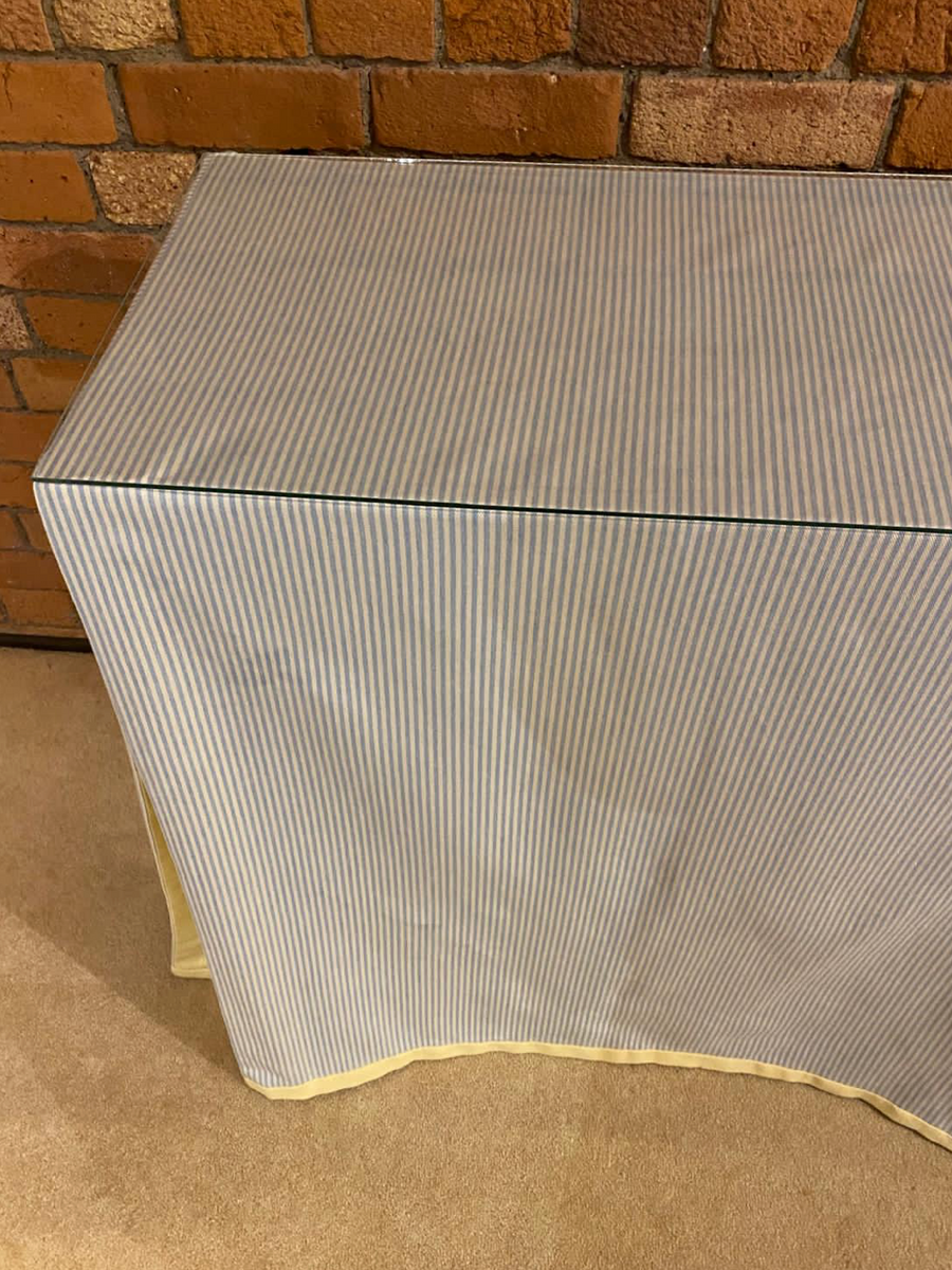Ruth Table with table cloth and glass top