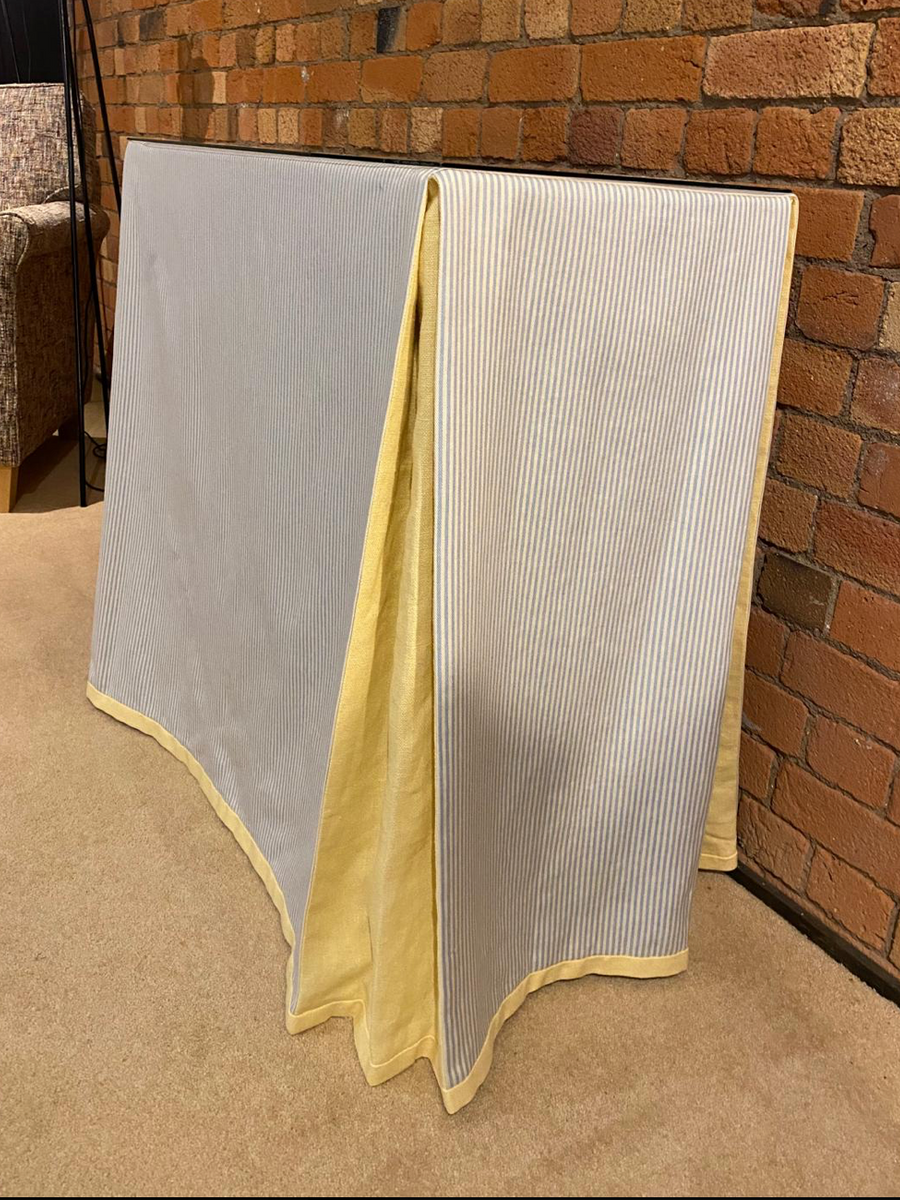 Ruth Table with table cloth and glass top
