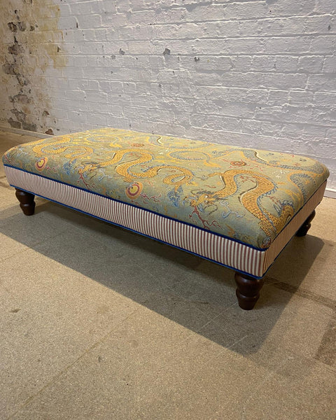 Bryher ottoman in Schumacher Serpentine Dragon and Caramel ticking
