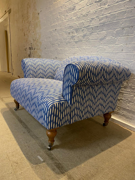 Bespoke loveseat in Linwood Smocked on castor legs