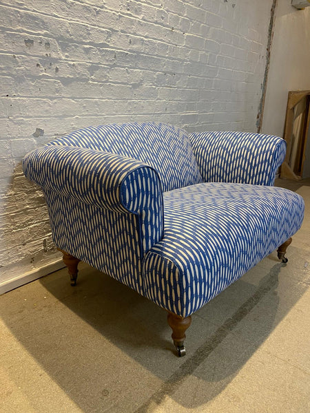 Bespoke loveseat in Linwood Smocked on castor legs