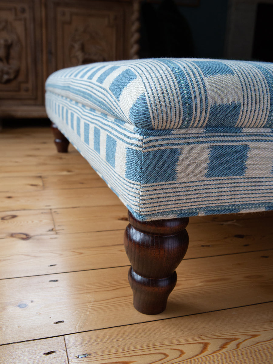 Available Now | Bryher Classic Ottoman In Christopher Farr Lost and Found Denim - The House Upstairs