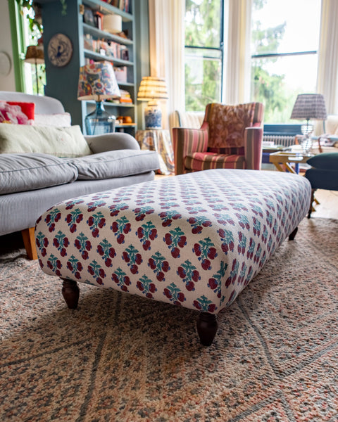 Vintage style ottoman upholstered in any fabric