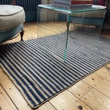 Jute carpet in Natural & Navy. Available in a range of sizes